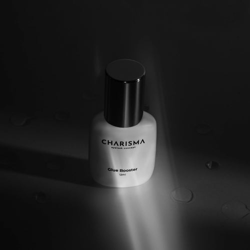 CHARISMA glue booster applied to a lash strip before dipping